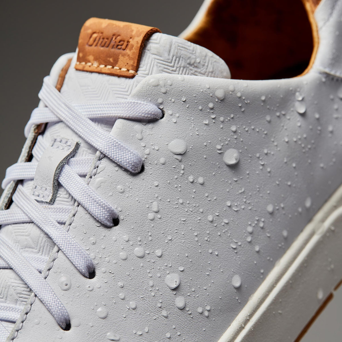 OluKai Best Seller - Lae‘ahi Lī ‘Ili Men's Leather Sneakers - Bright White