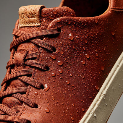 OluKai Essential - Lae‘ahi Lī ‘Ili Men's Leather Sneakers - Kukui Brown