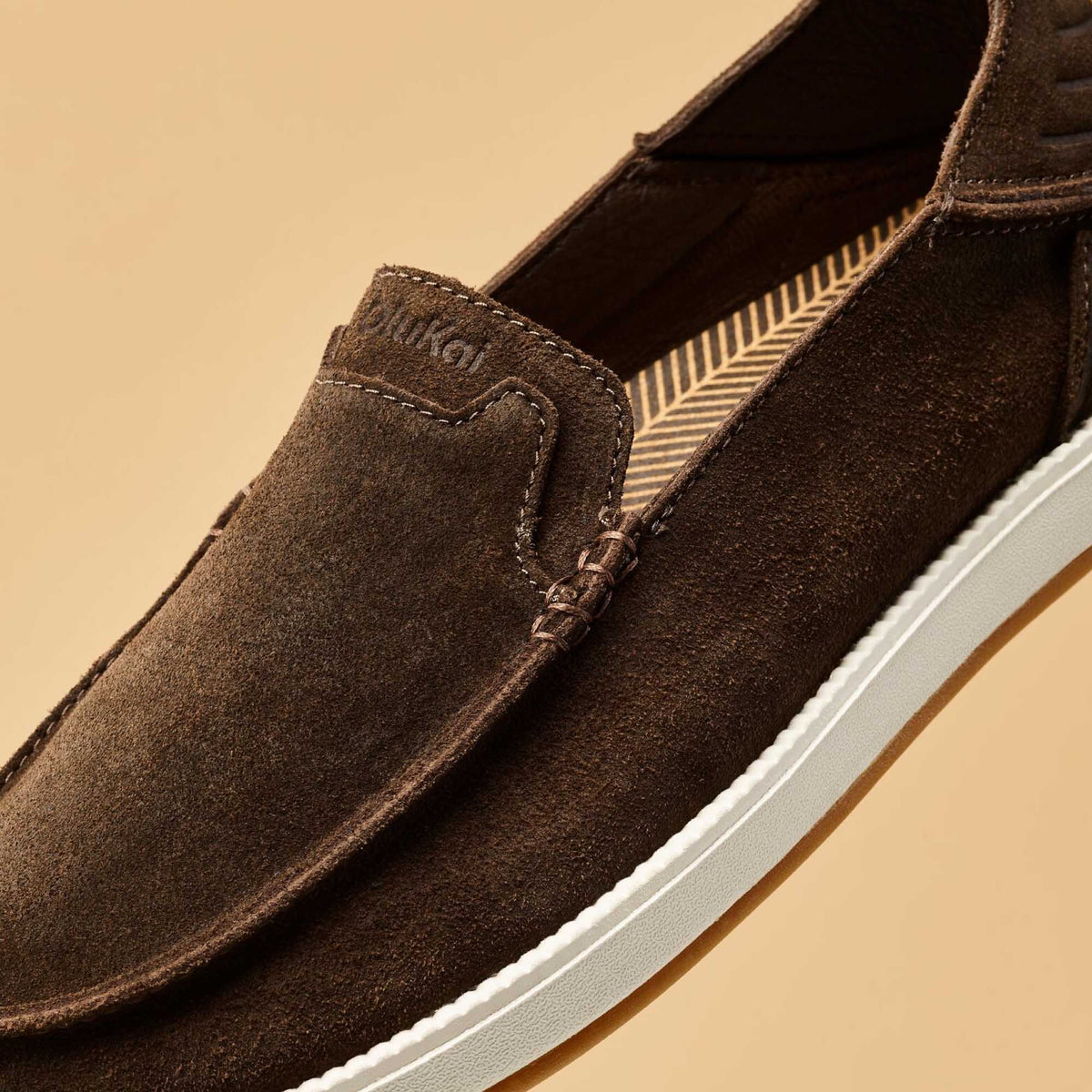OluKai Featured - Kākaha Nia Men‘s Suede Slip-On Shoes - Dark Wood