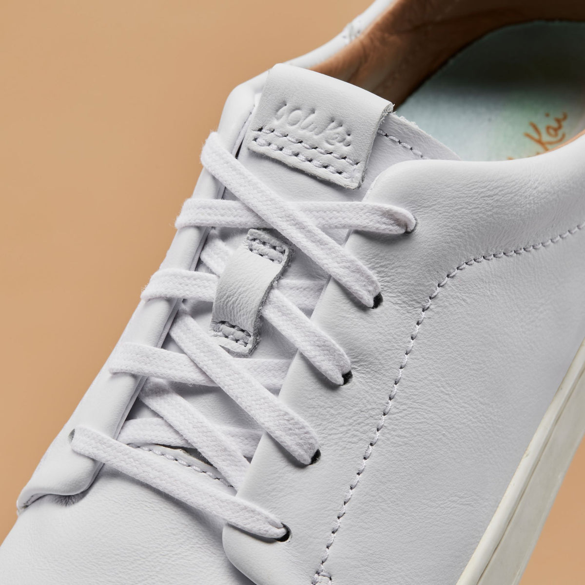 OluKai Trending - Pehuea Lī ‘Ili Women's Leather Sneakers - White