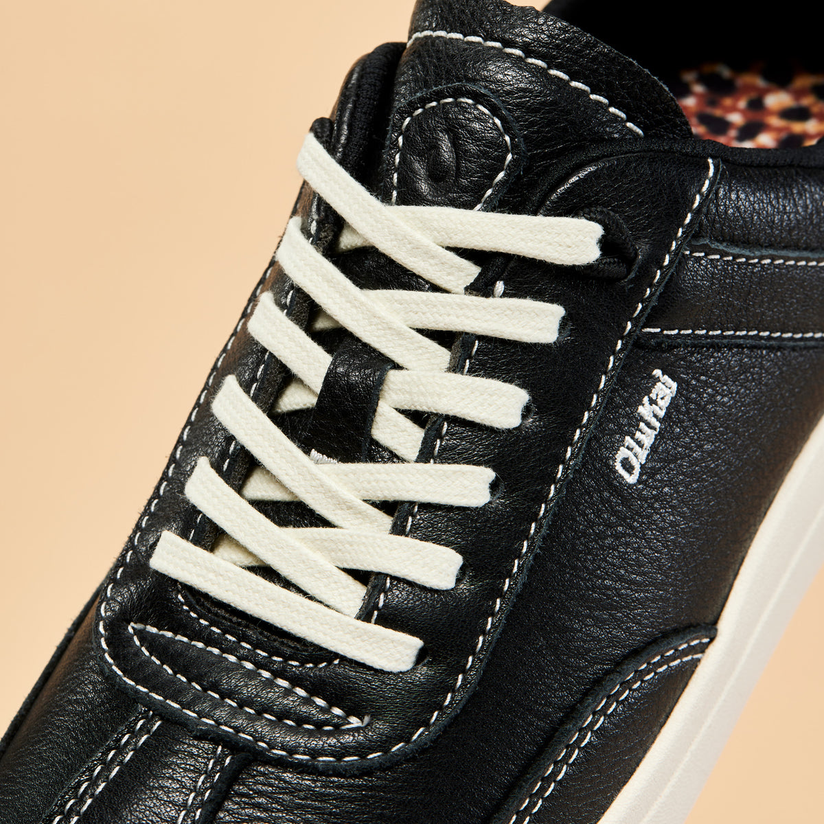 OluKai Exclusive - Hā‘upu Women’s Leather Sneakers - Onyx